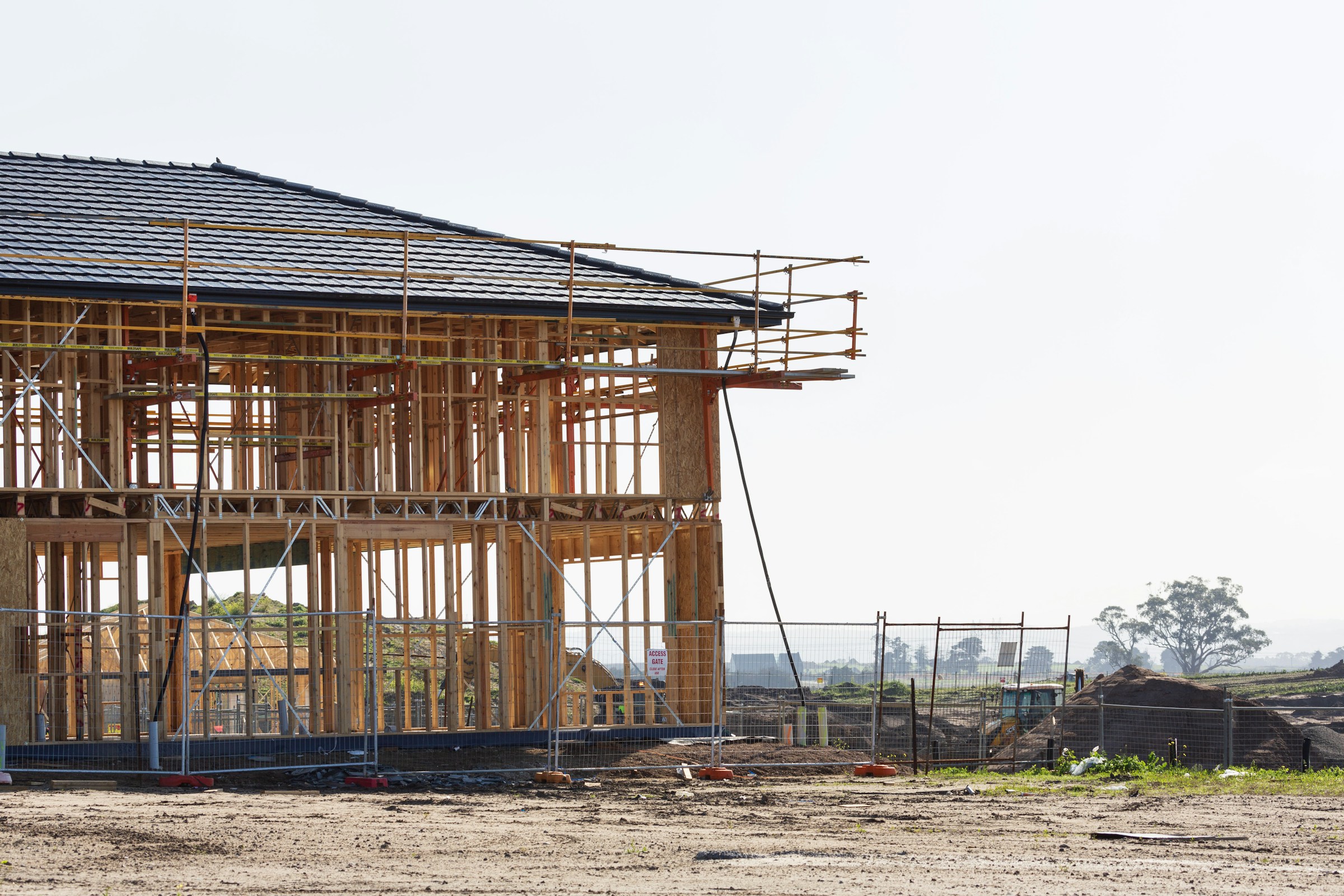 Scaffolding around a two-storey Australian home under construction